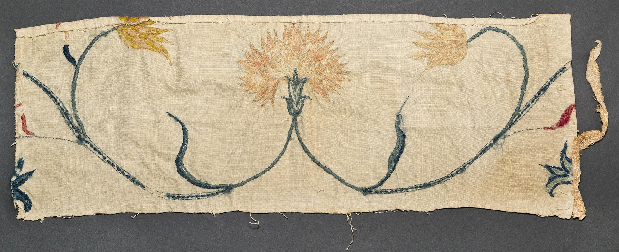 1969.1239 Textile fragment, embroidered, view 2, reverse