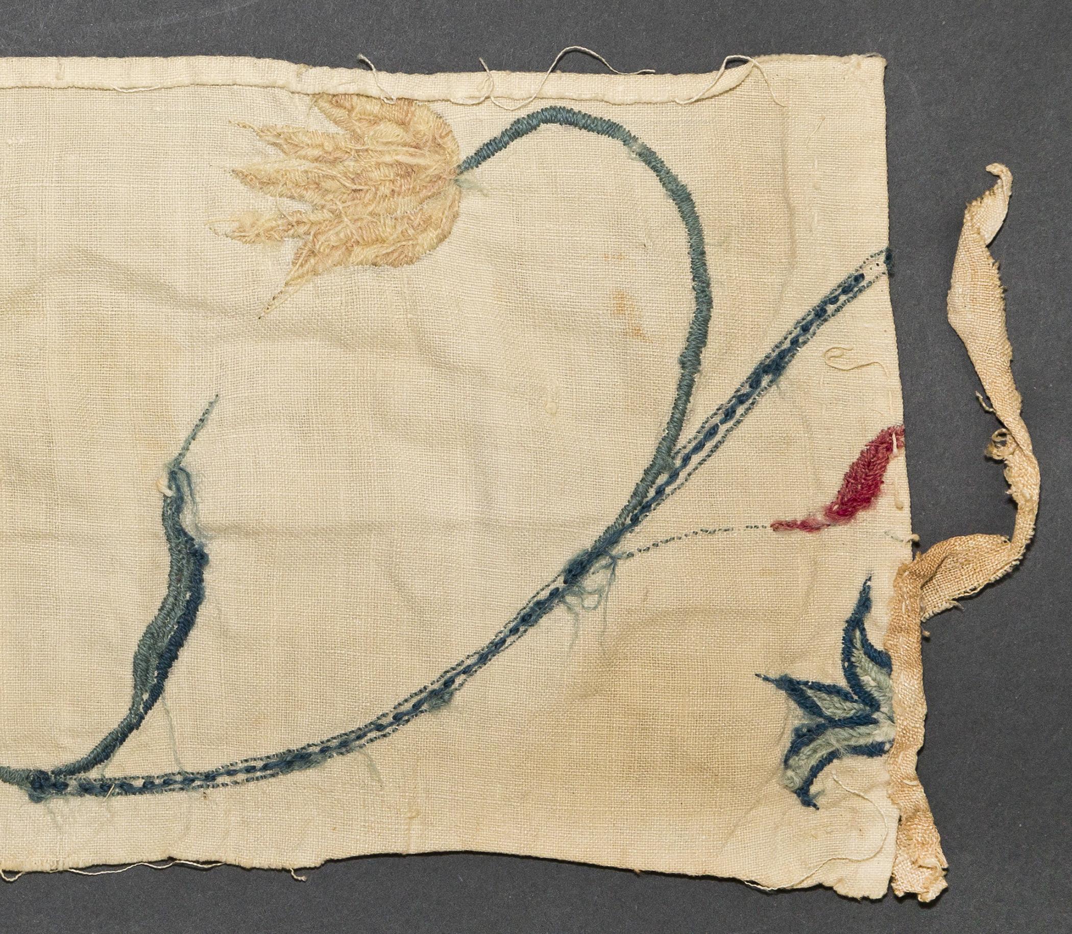 1969.1239 Textile fragment, embroidered, reverse, detail 1