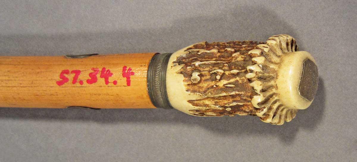 1957.0034.004, Cane, head detail