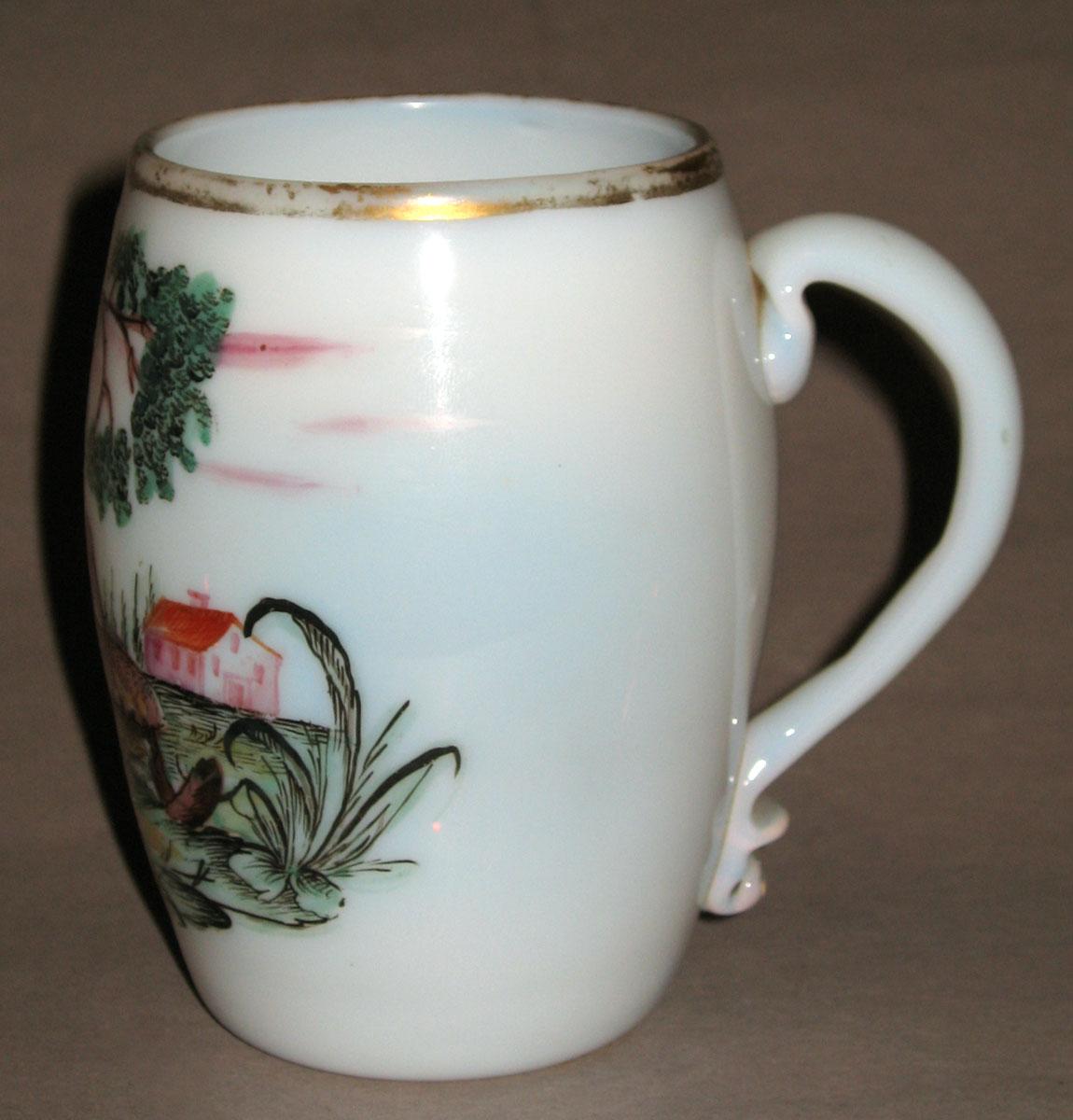 1969.1429 White glass mug (profile)