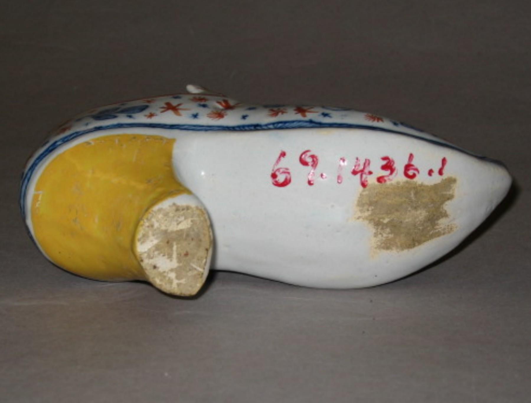 1969.1436.001 Tin-glazed earthenware shoe (underside)