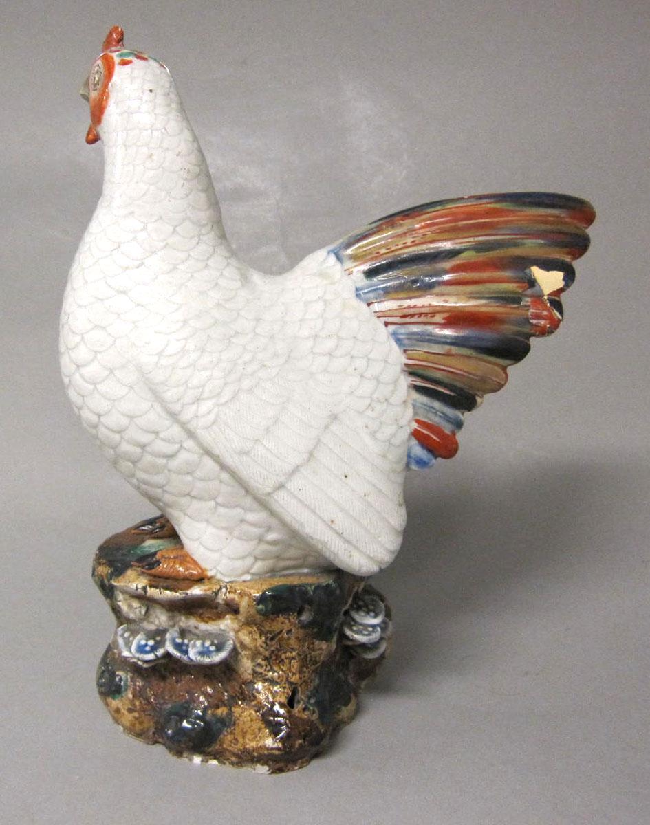1969.1529.001 Porcelain figure chicken side two