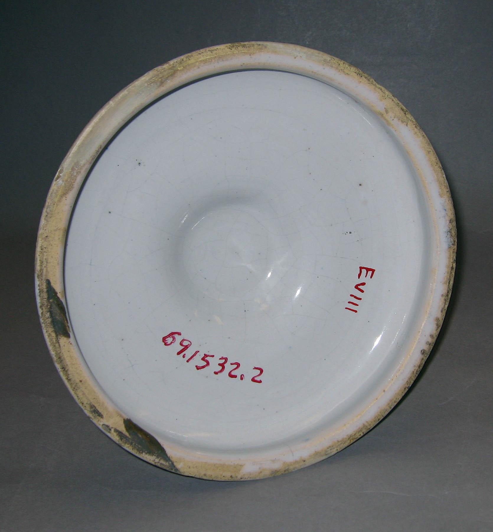 1969.1532.002 Earthenware candlestick (underside)