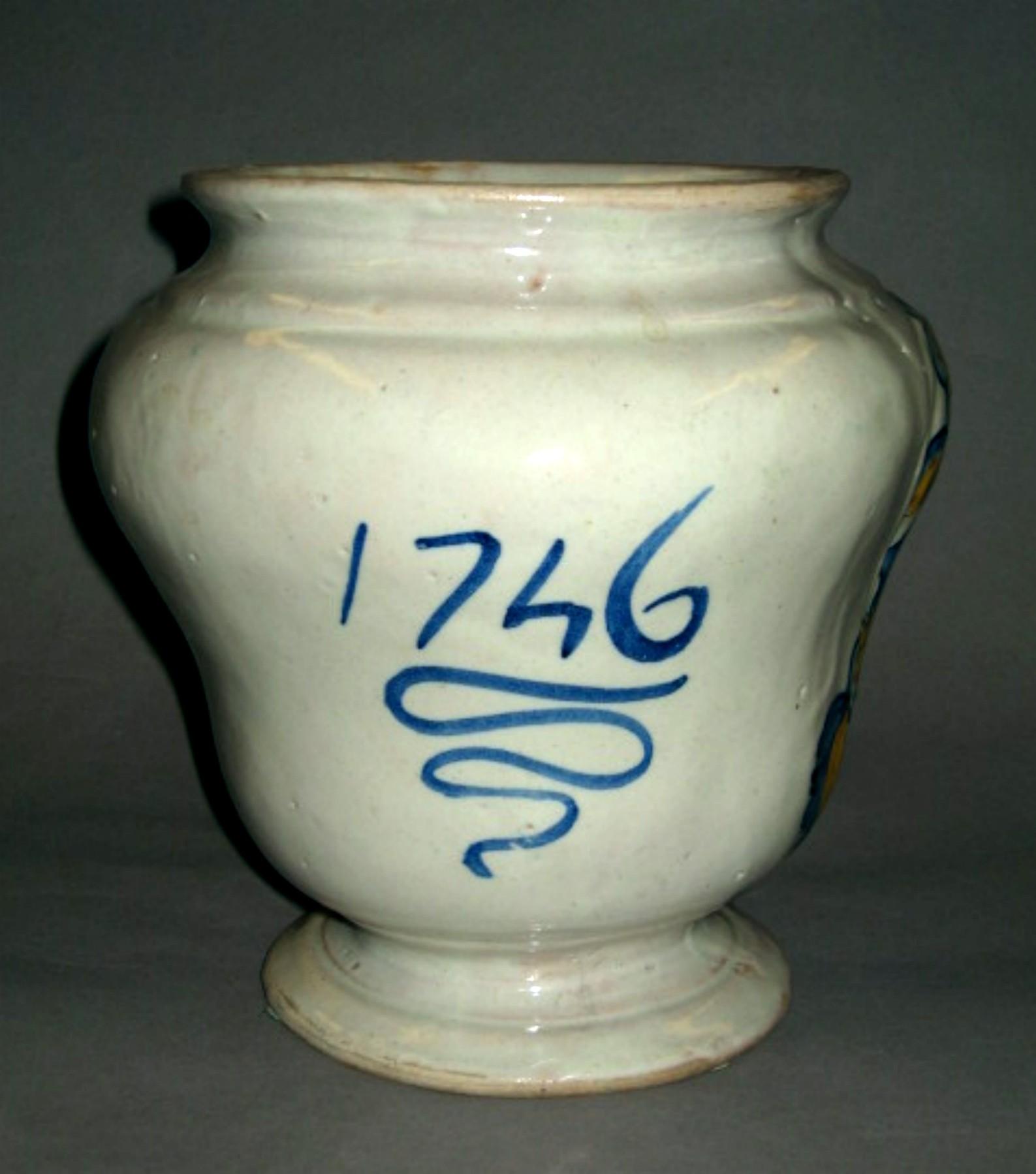 1969.1533.002 Tin-glazed earthenware vase (reverse)