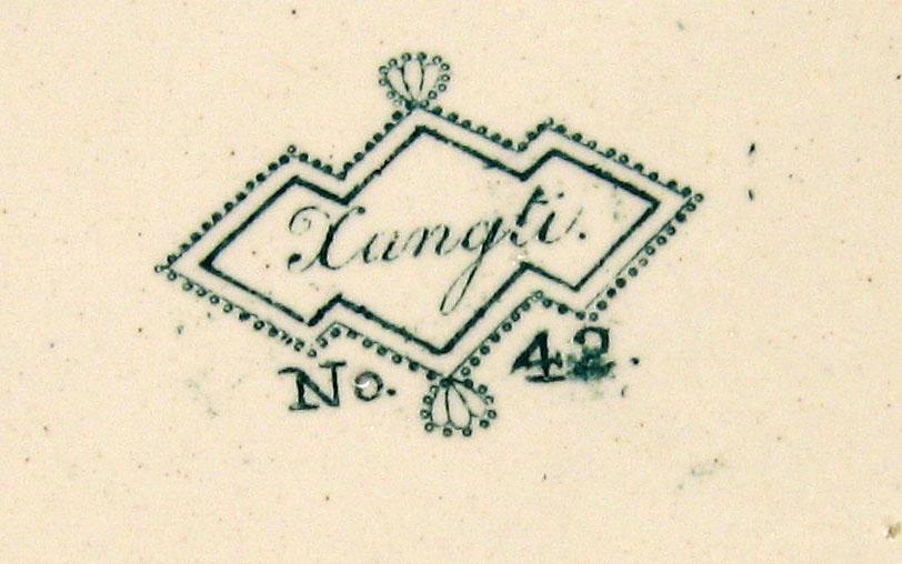 1969.1603 Xangti cup plate mark