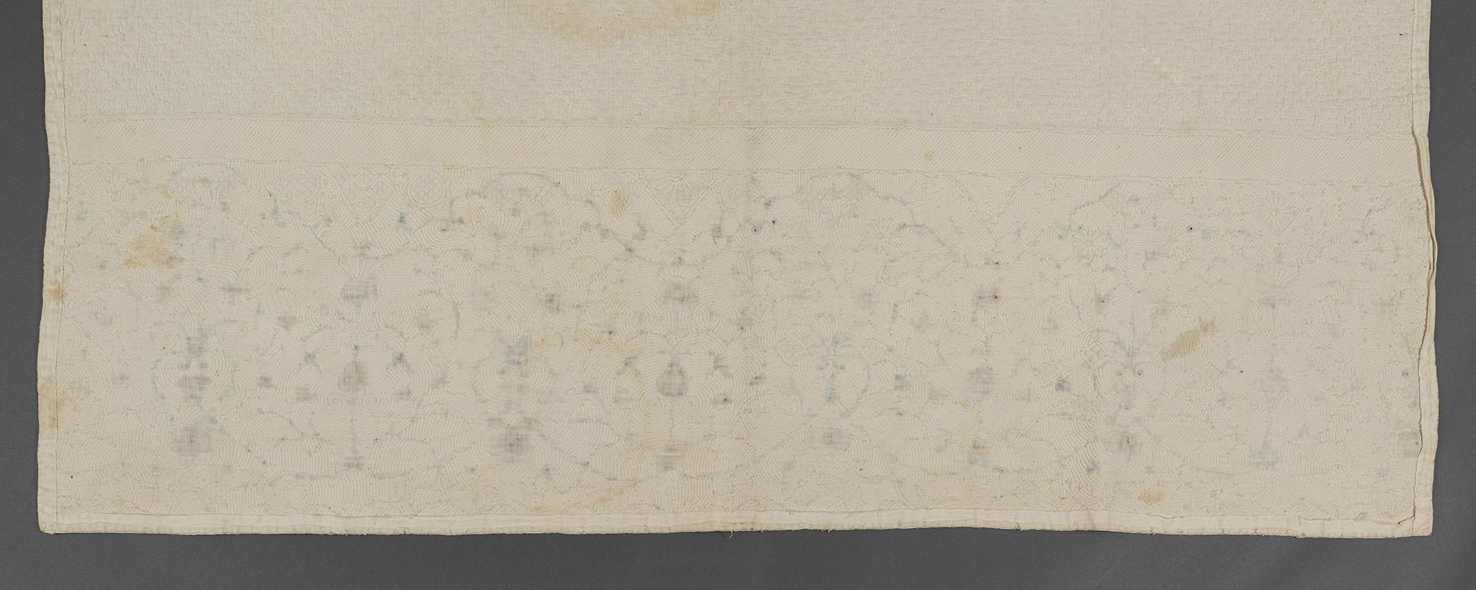 1969.1708 Petticoat fragment, detail 1, reverse