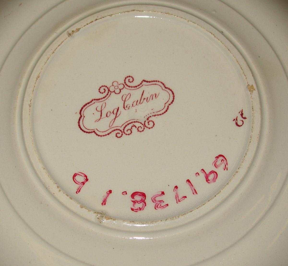 1969.1738.001 B Adams earthenware saucer (underside)