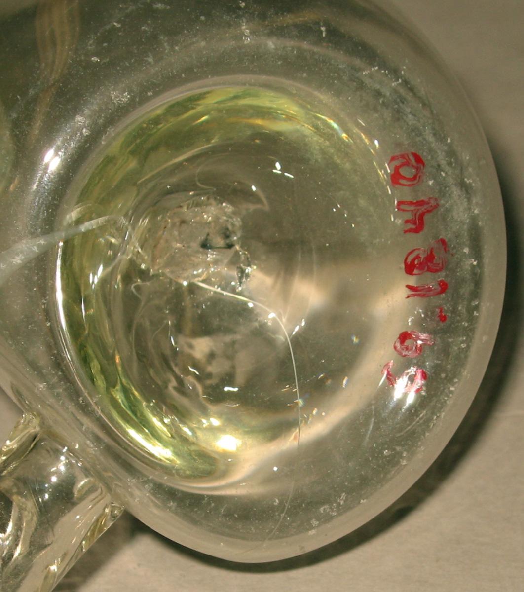 1969.1840 Glass bird feeder (underside)