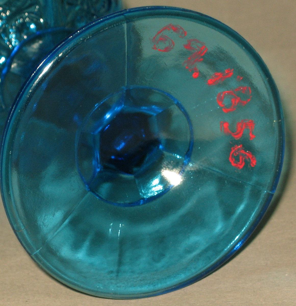 1969.1856 Pressed glass wineglass (underside)