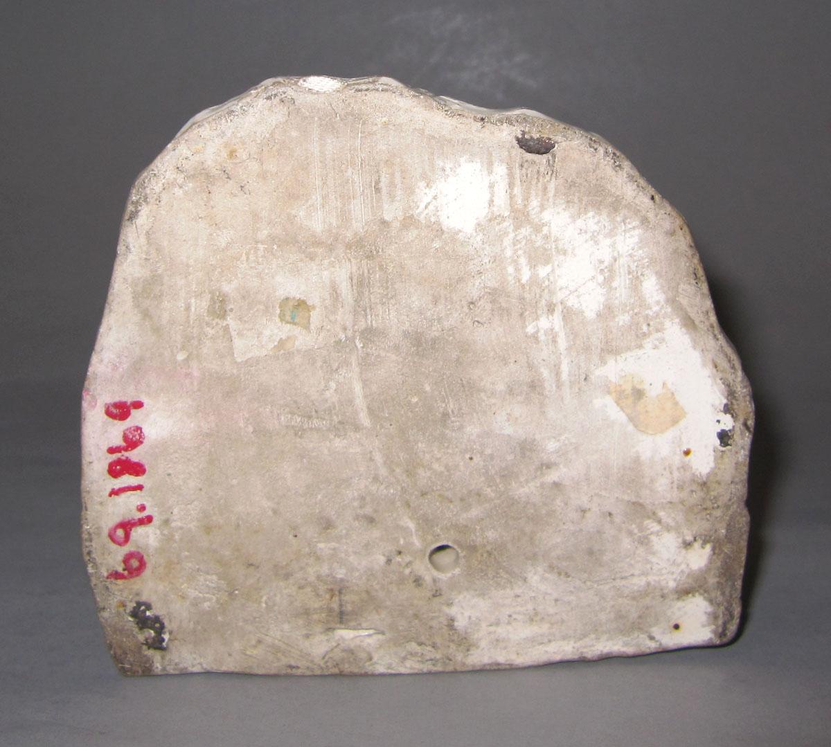 1969.1869 Delft figure underside