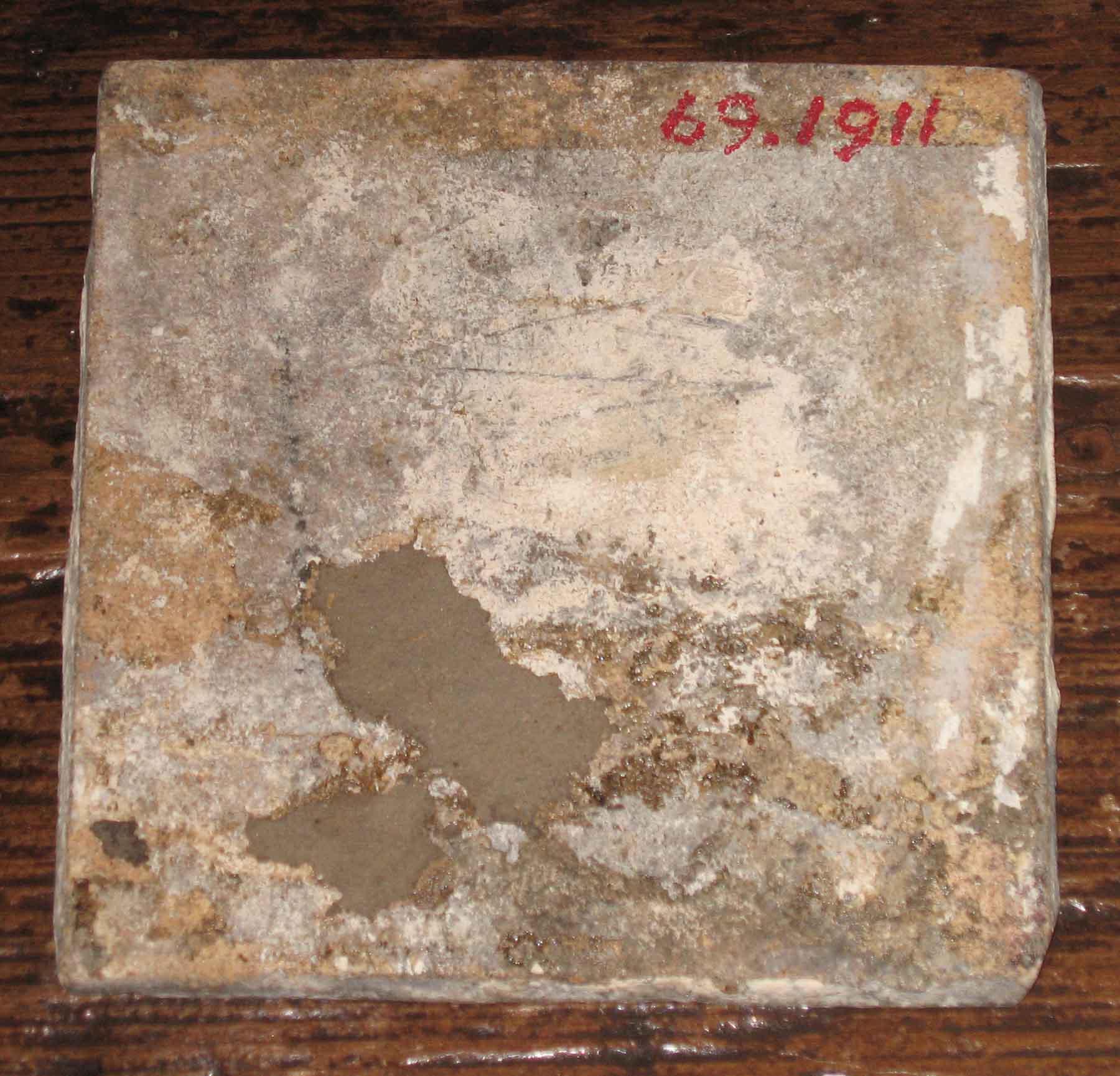 1969.1911 Delft tile (back)