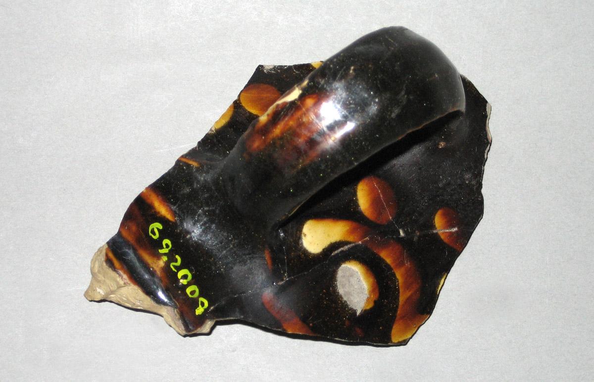 1969.2009 Ceramic fragment side1
