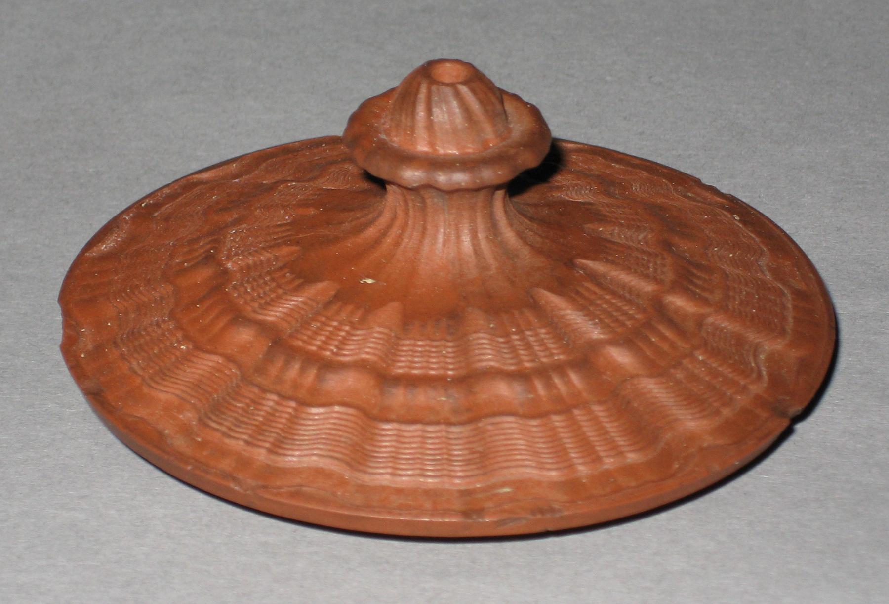 1969.2016 Unglazed redware teapot lid