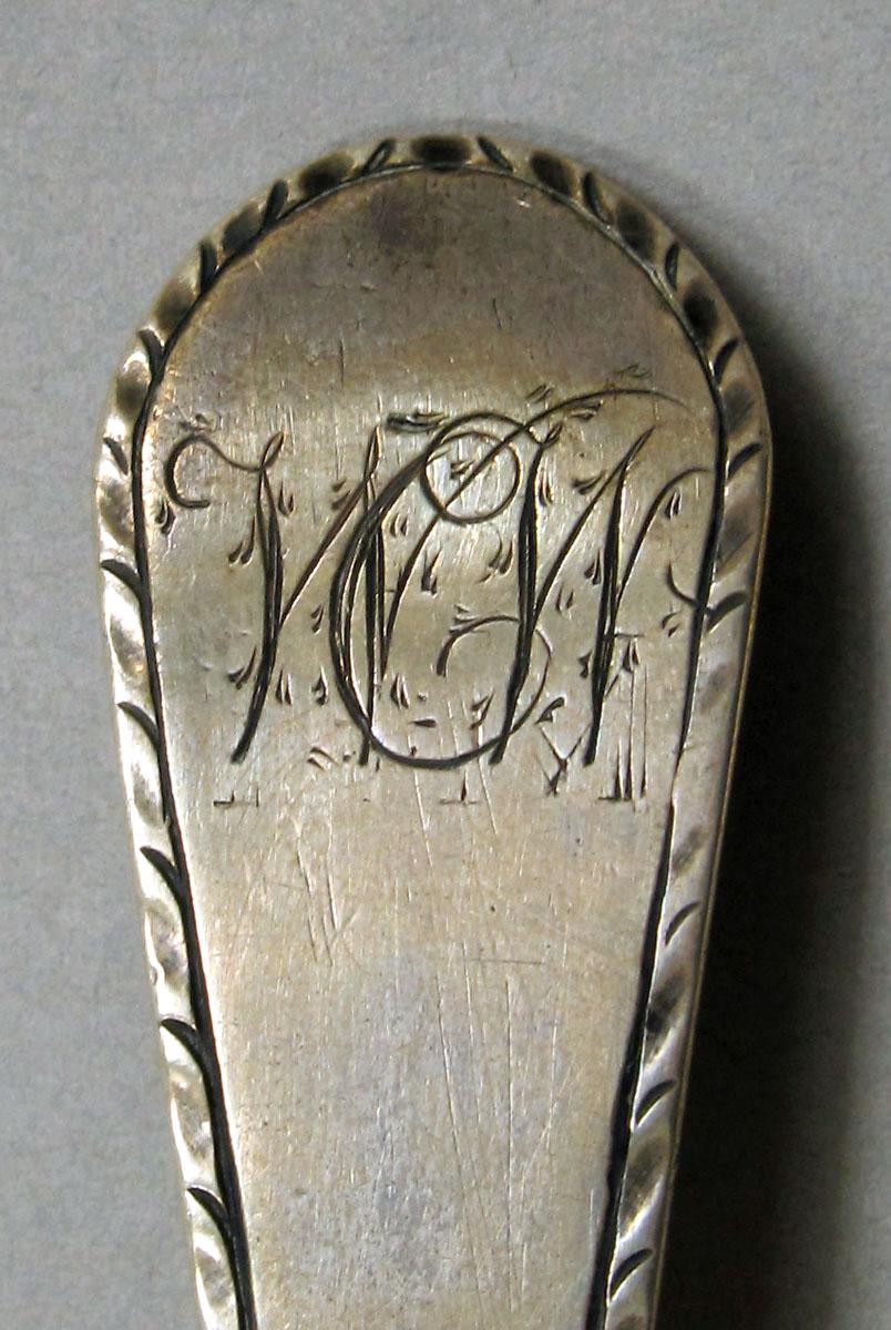 1957.0059.002 Silver spoon engraving