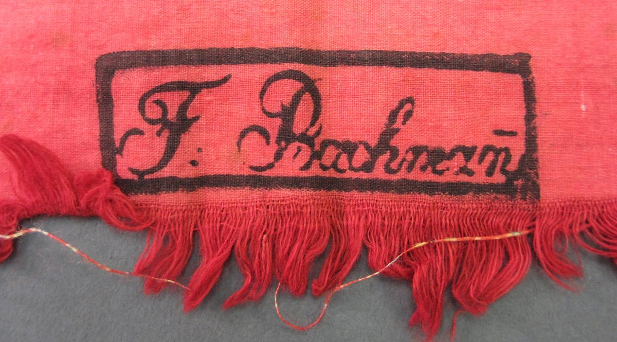 1962.0163.021 Textile, printed inscription 2