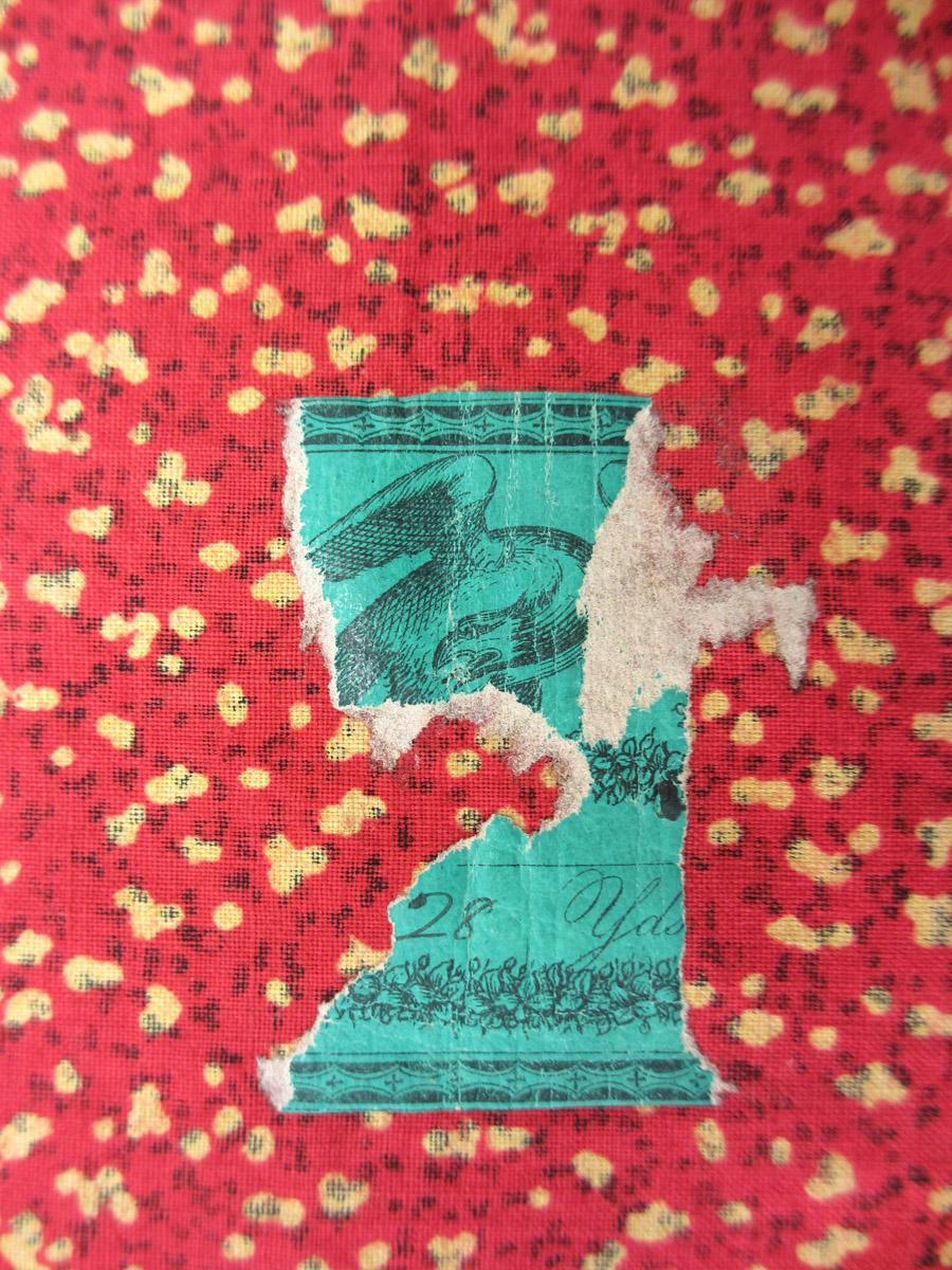1962.0163.022 Textile, printed partial label