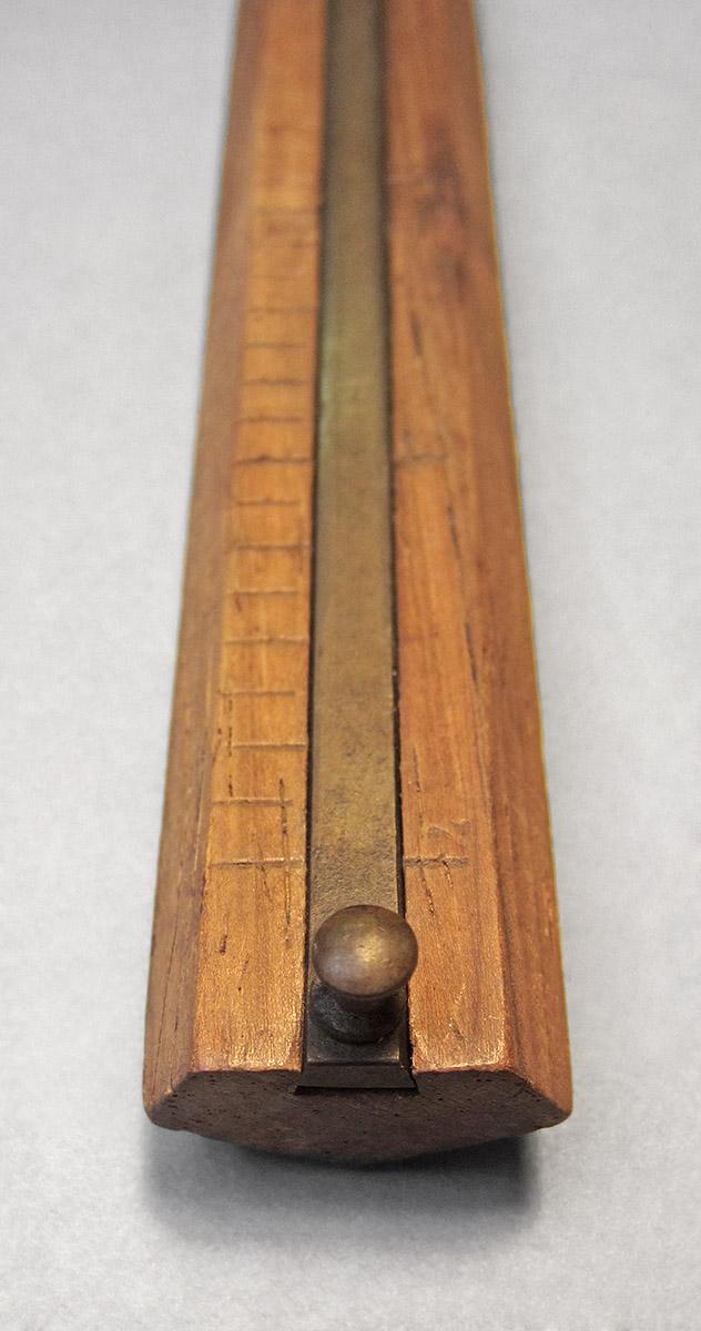 1957.071.012, Marking gauge, end 1