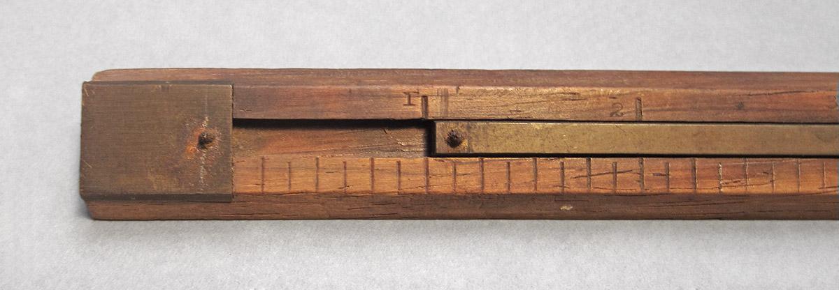 1957.071.012, Marking gauge, end 2
