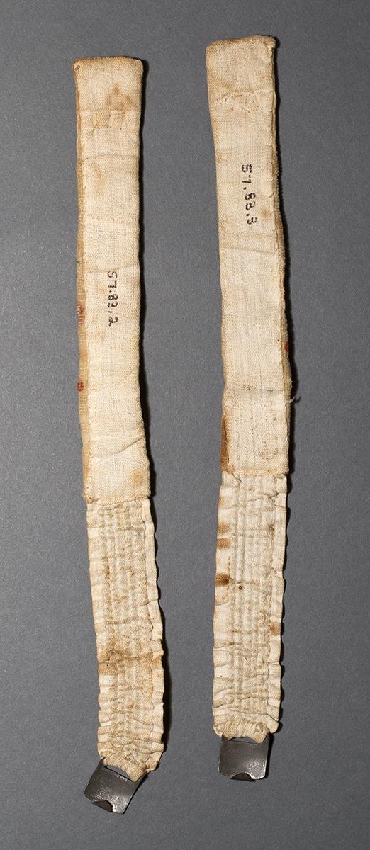 1957.0083.002,.003 Garters, Verso