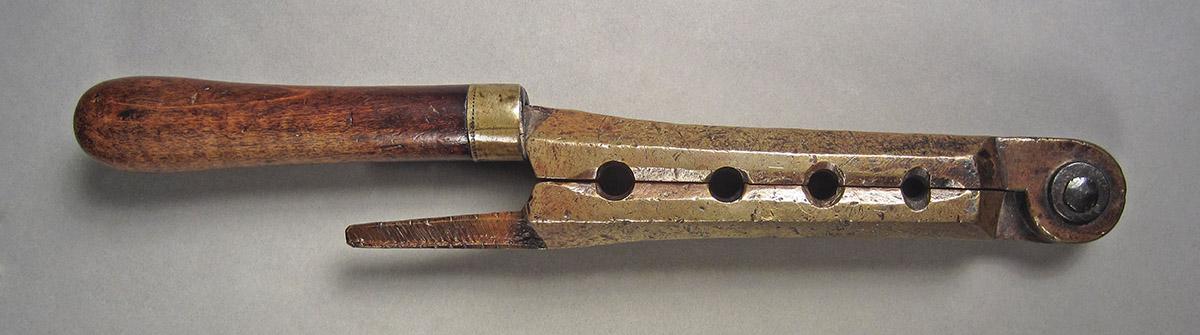 1957.0084.002, Bullet mold, side 1
