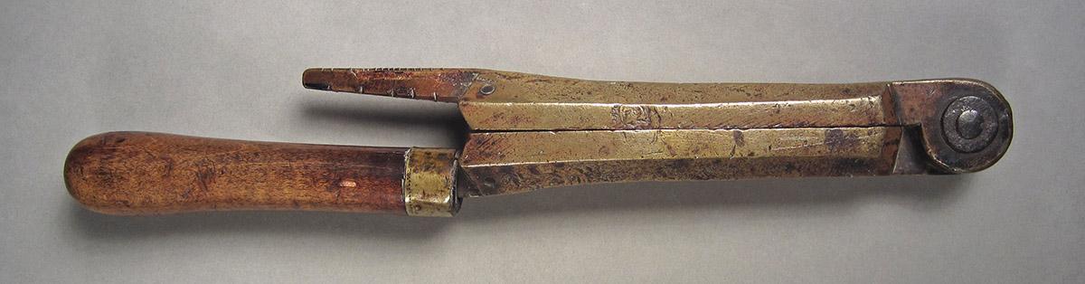 1957.0084.002, Bullet mold, side 2