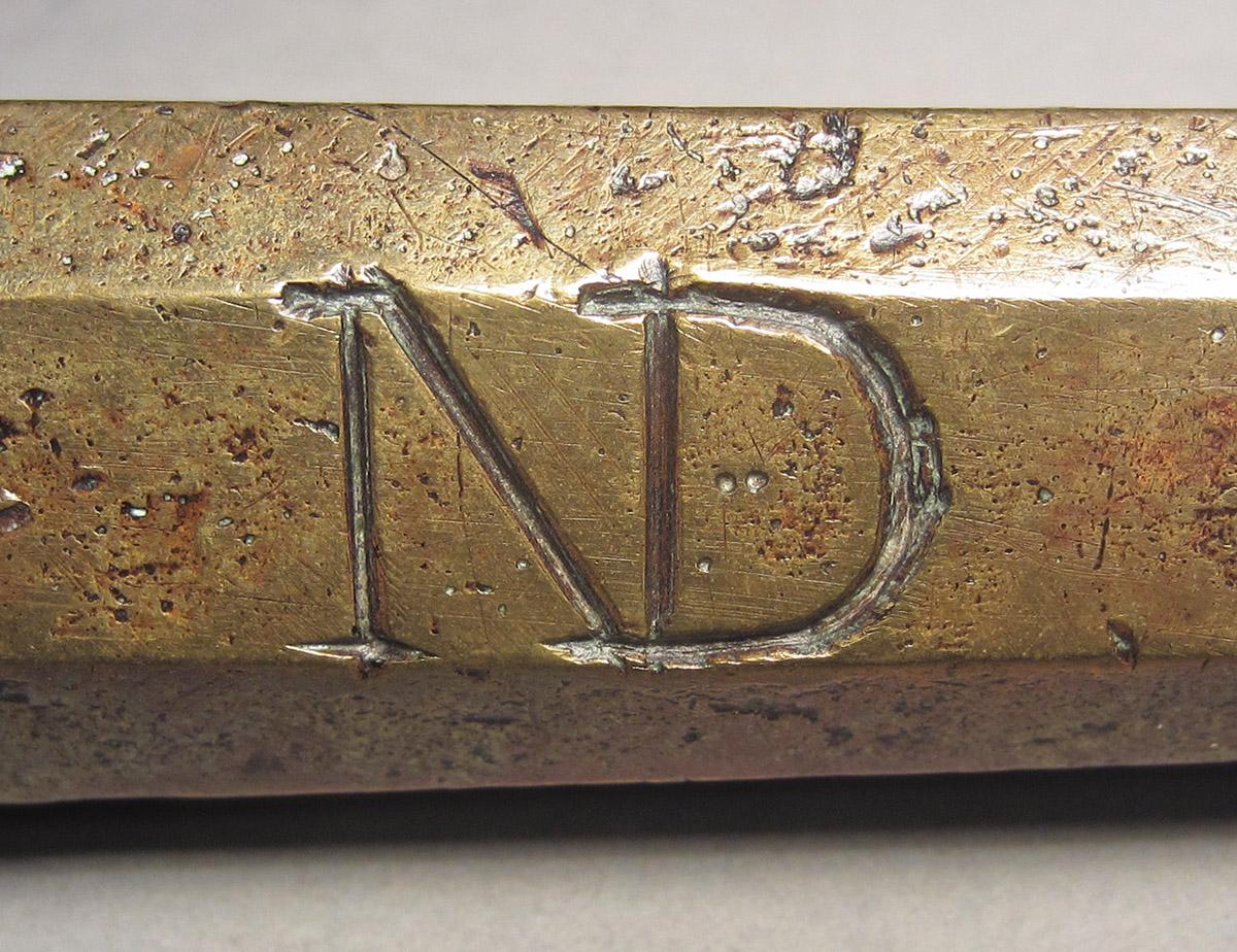 1957.0084.002, Bullet mold, mark