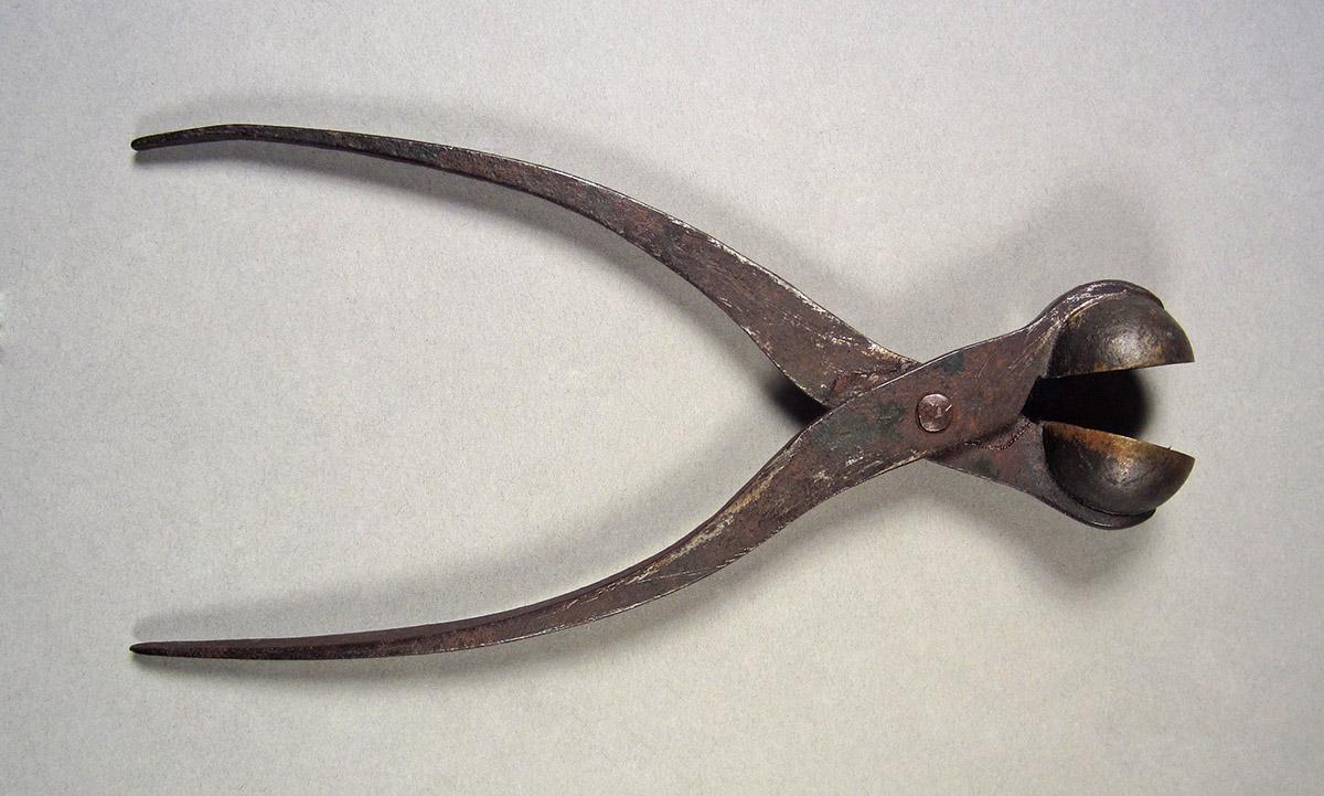 1957.0084.008, Bullet mold, side 2