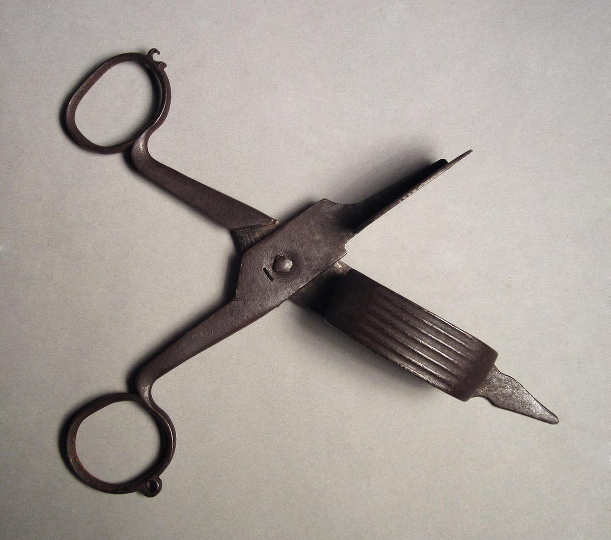 1957.0084.009, Snuffer, open side 1