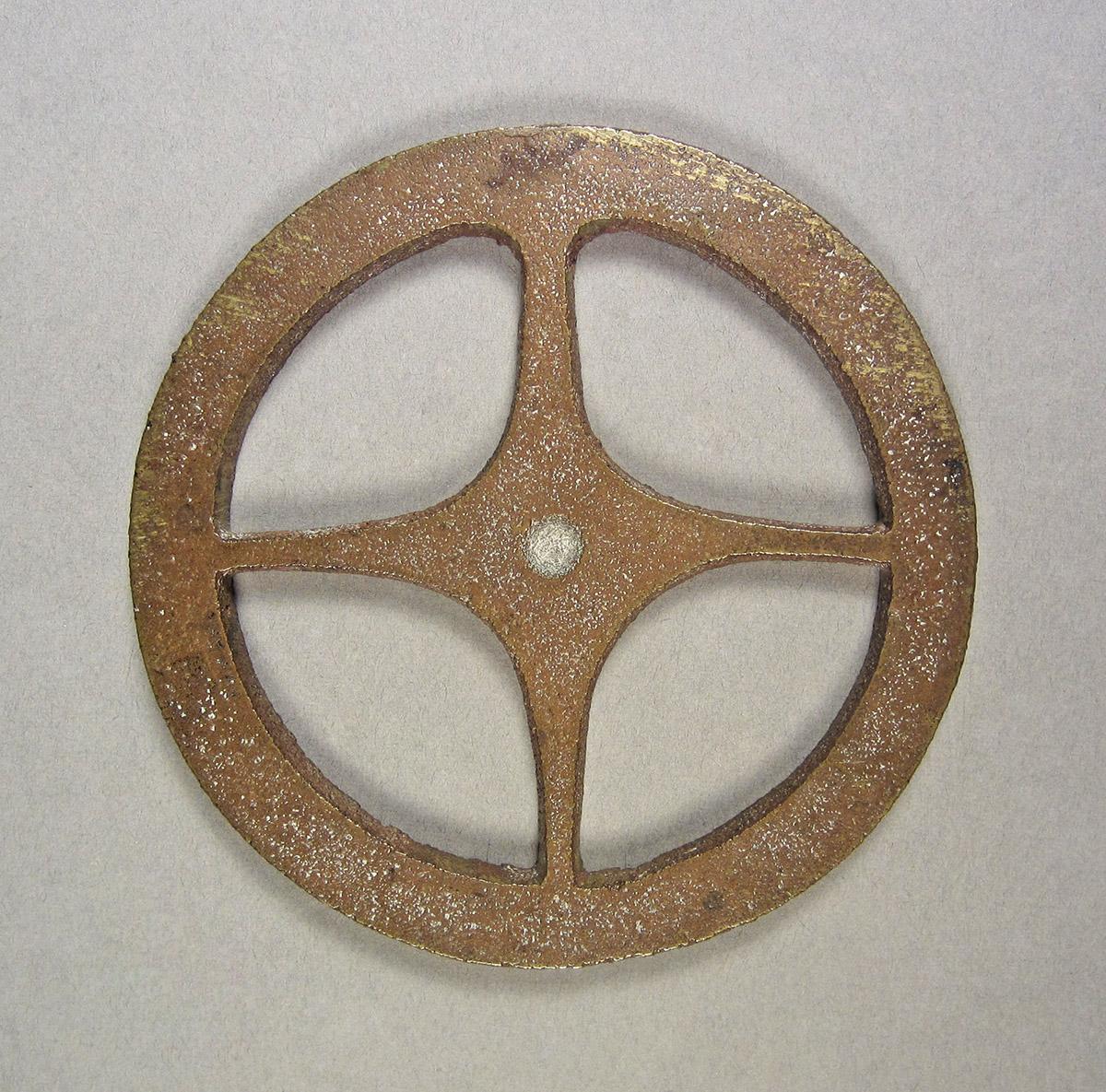 1957.0084.024, Clock wheel template, side 1