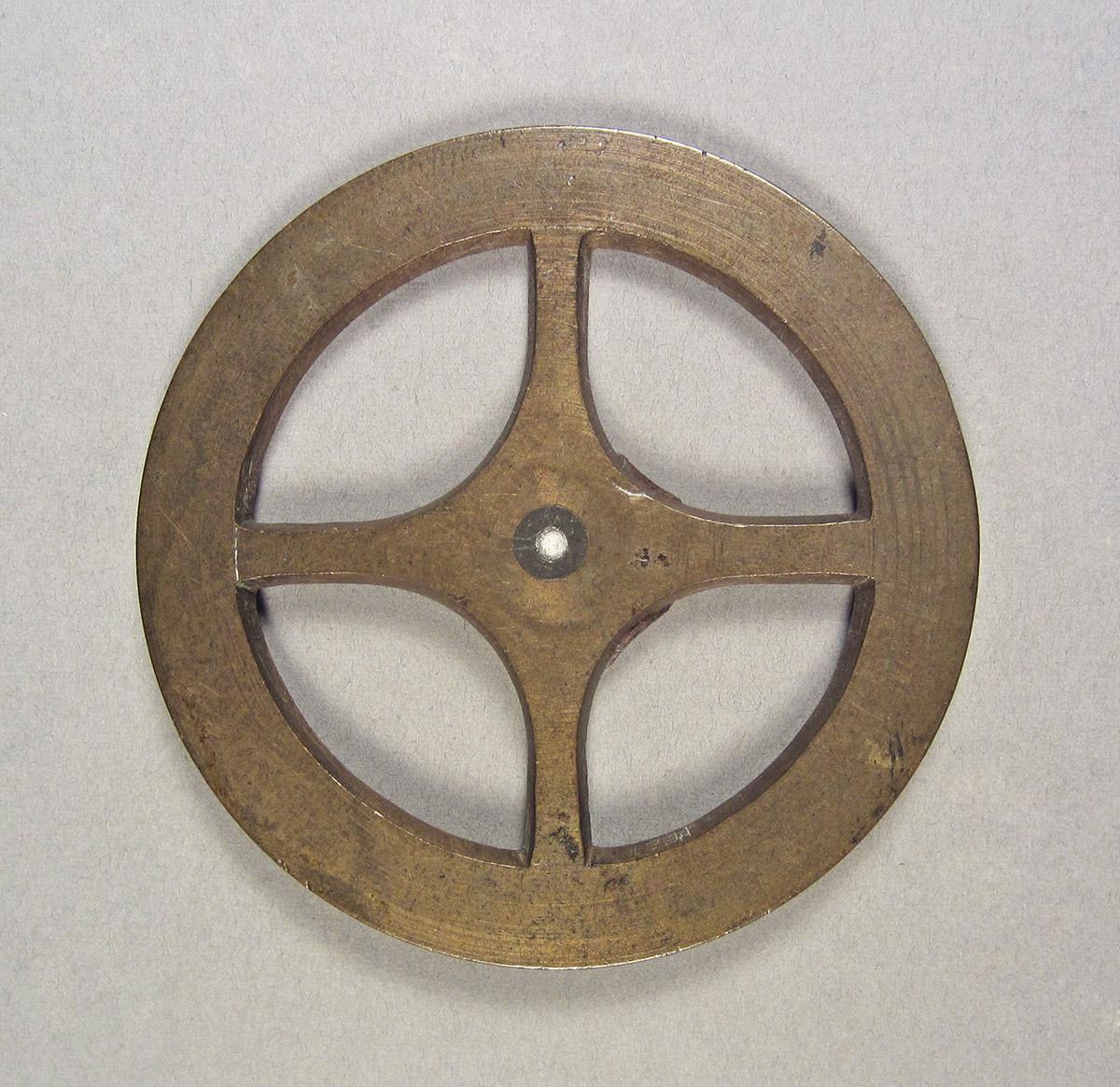 1957.0084.025, Clock wheel template, side 1
