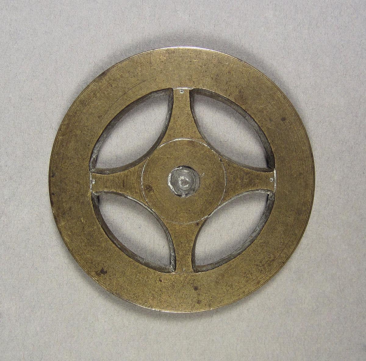1957.0084.027, Clock wheel template, side 1