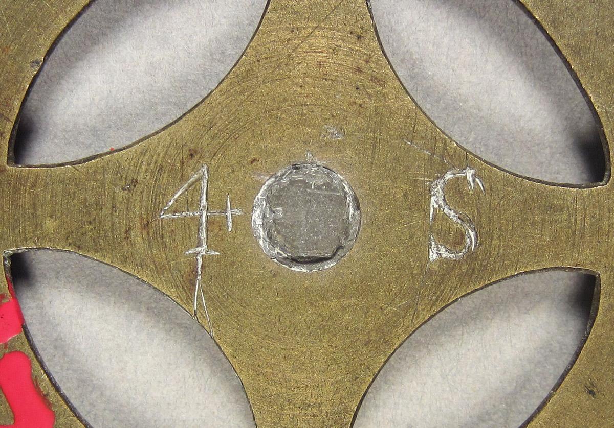 1957.0084.027, Clock wheel template, marks