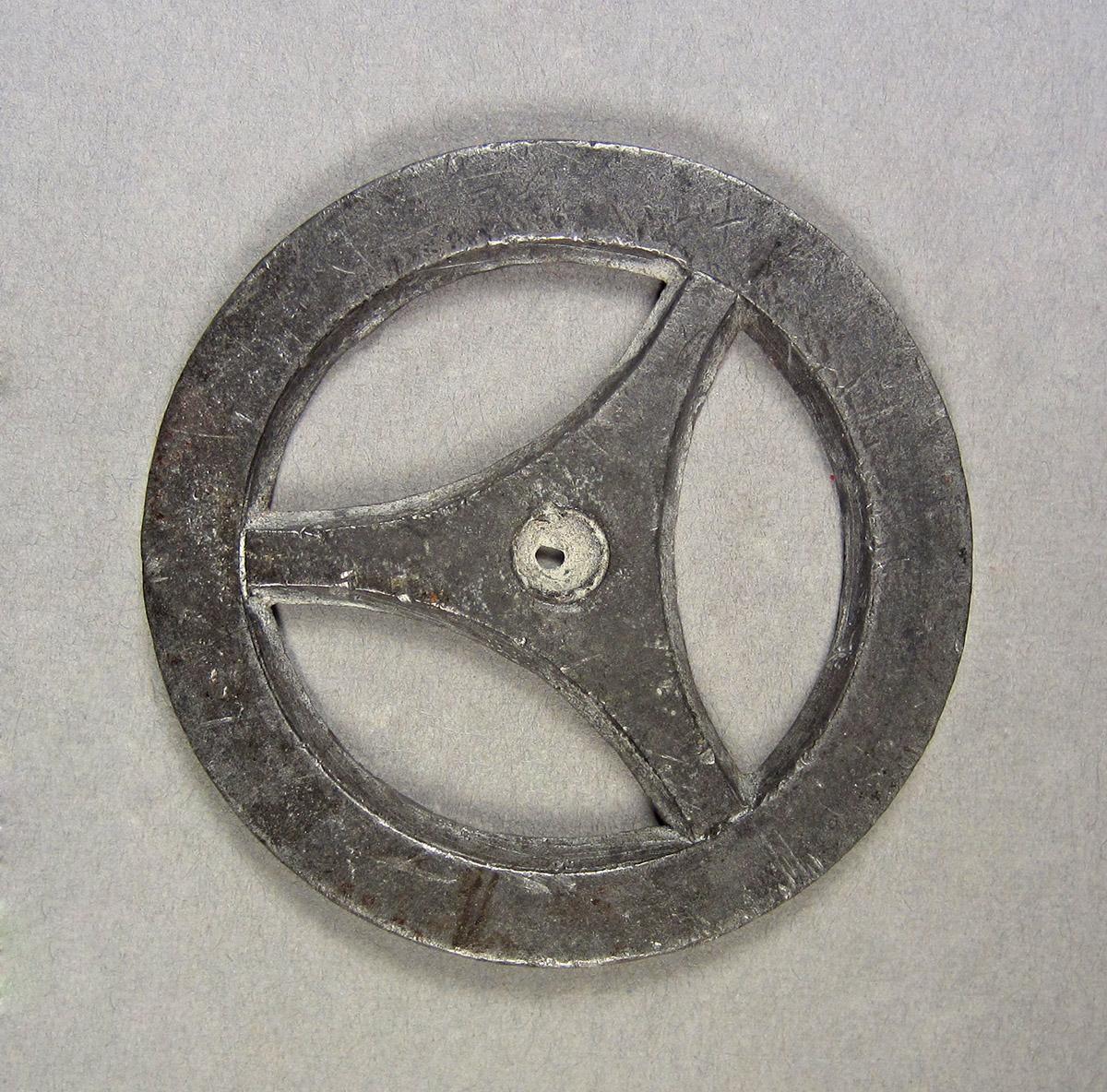 1957.0084.028, Clock wheel template, side 1