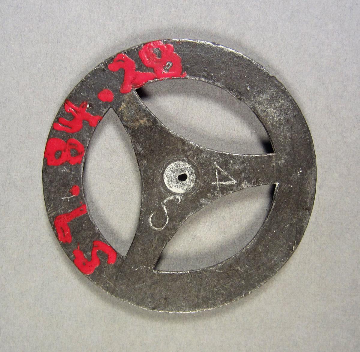 1957.0084.028, Clock wheel template, side 2