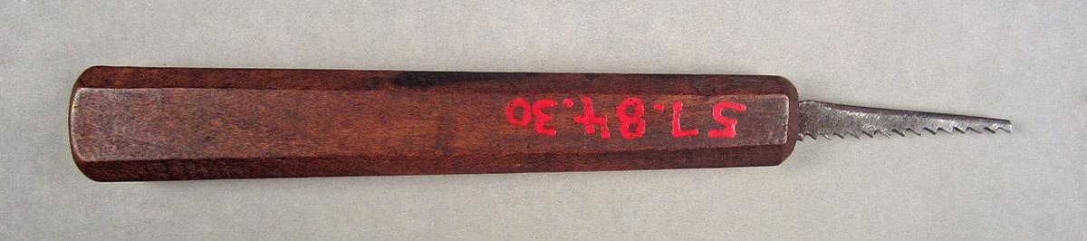 1957.0084.030, Keyhole saw, side 1