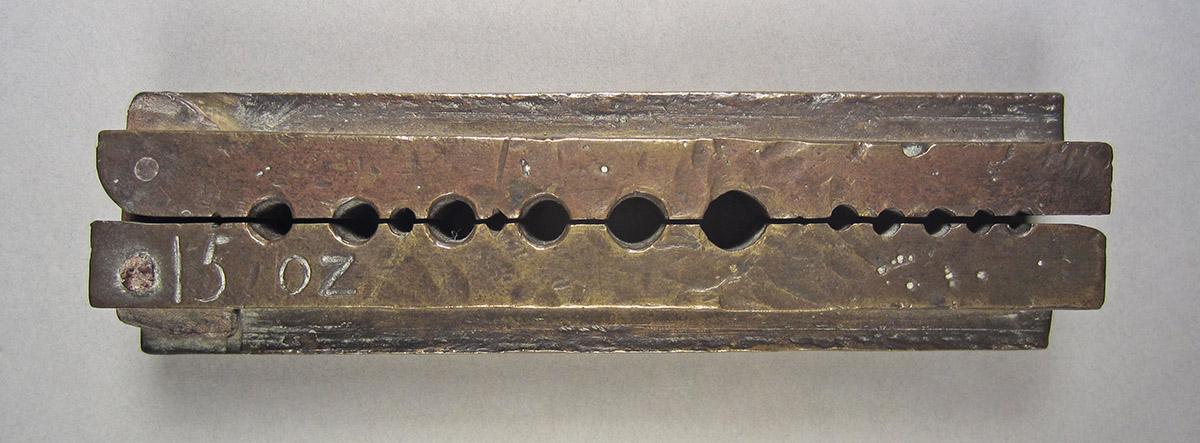 1957.0084.053, Wire vise, side 1