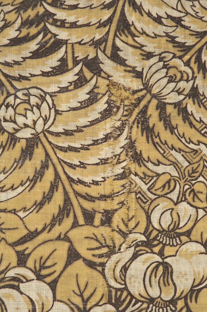 1969.3092 Textile, printed, detail 1, before conservation treatment