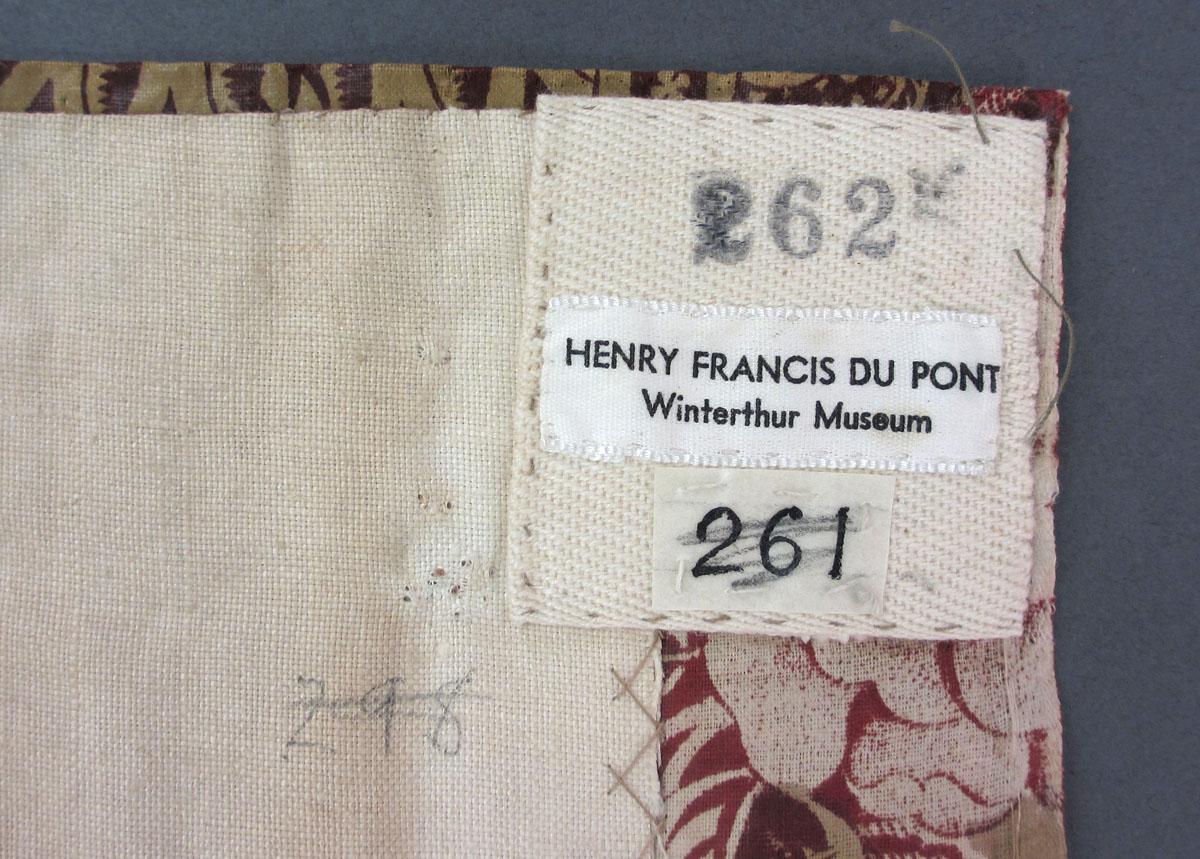 1969.3130 Textile, printed label and inscription