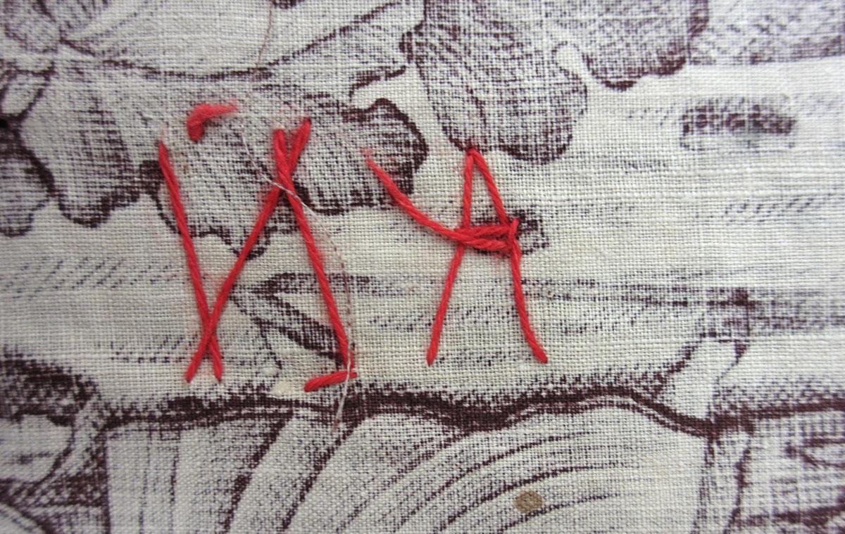 1969.3300 Textile, printed inscription