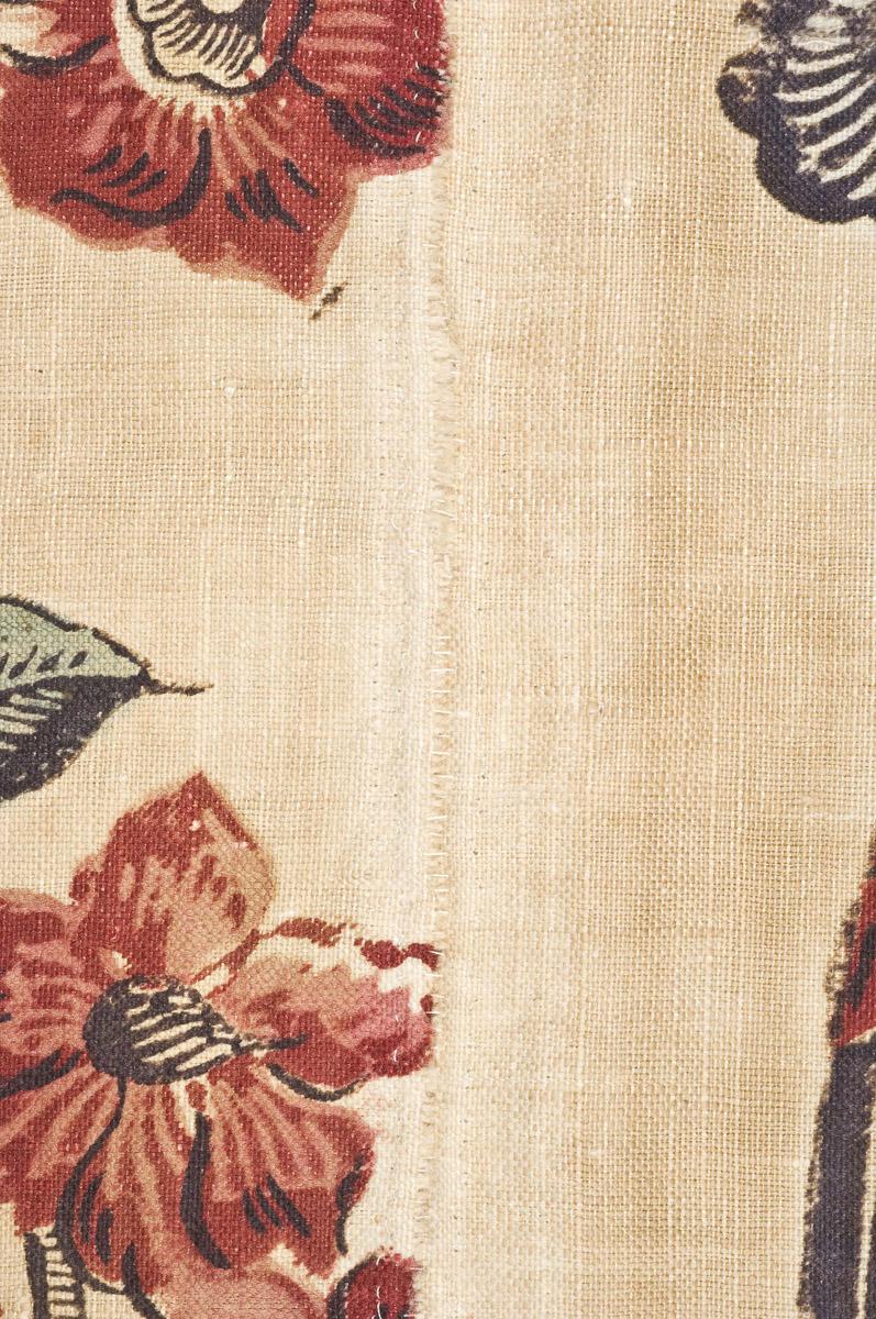 1969.3321 Textile, printed, detail 1, before conservation treatment