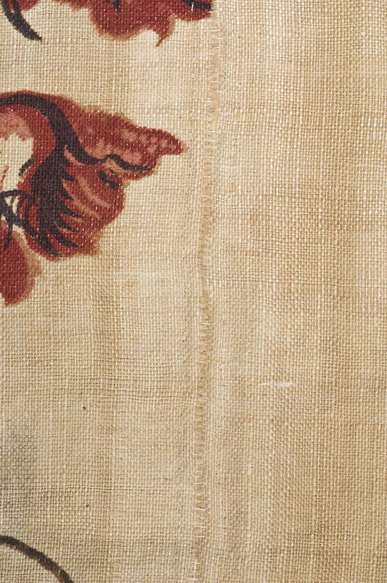 1969.3321 Textile, printed, detail 2, before conservation treatment