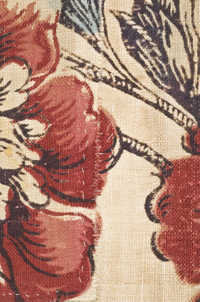 1969.3321 Textile, printed, detail 4, before conservation treatment