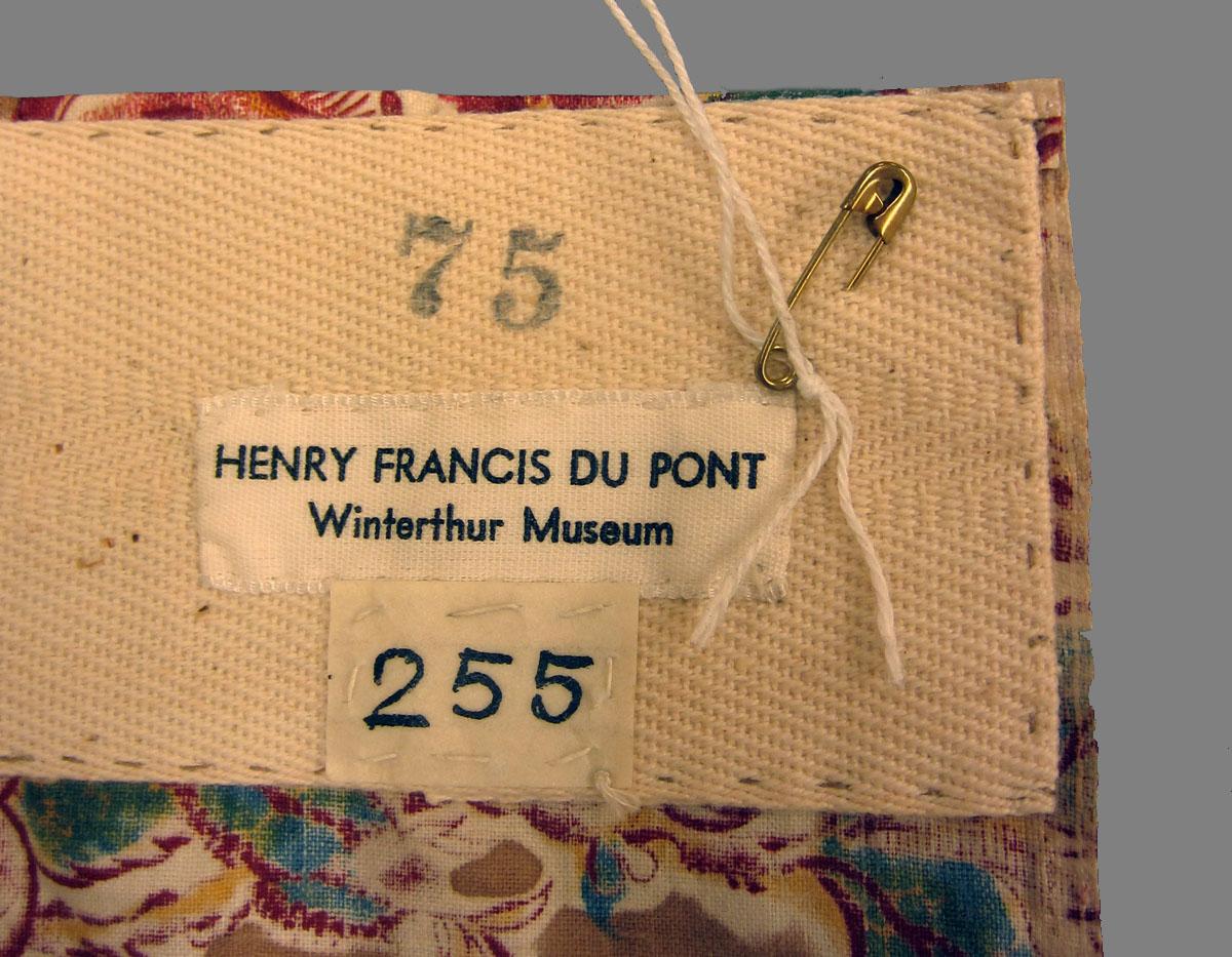 1969.3351 Textile, printed label