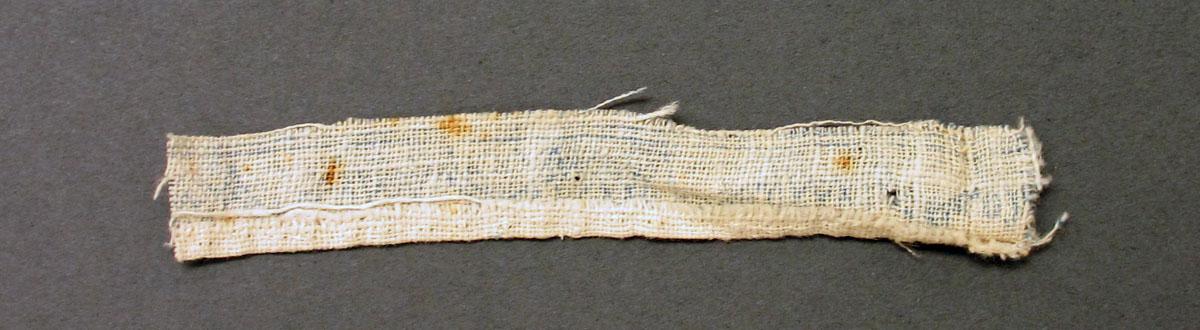 1969.3375 E Textile, printed reverse