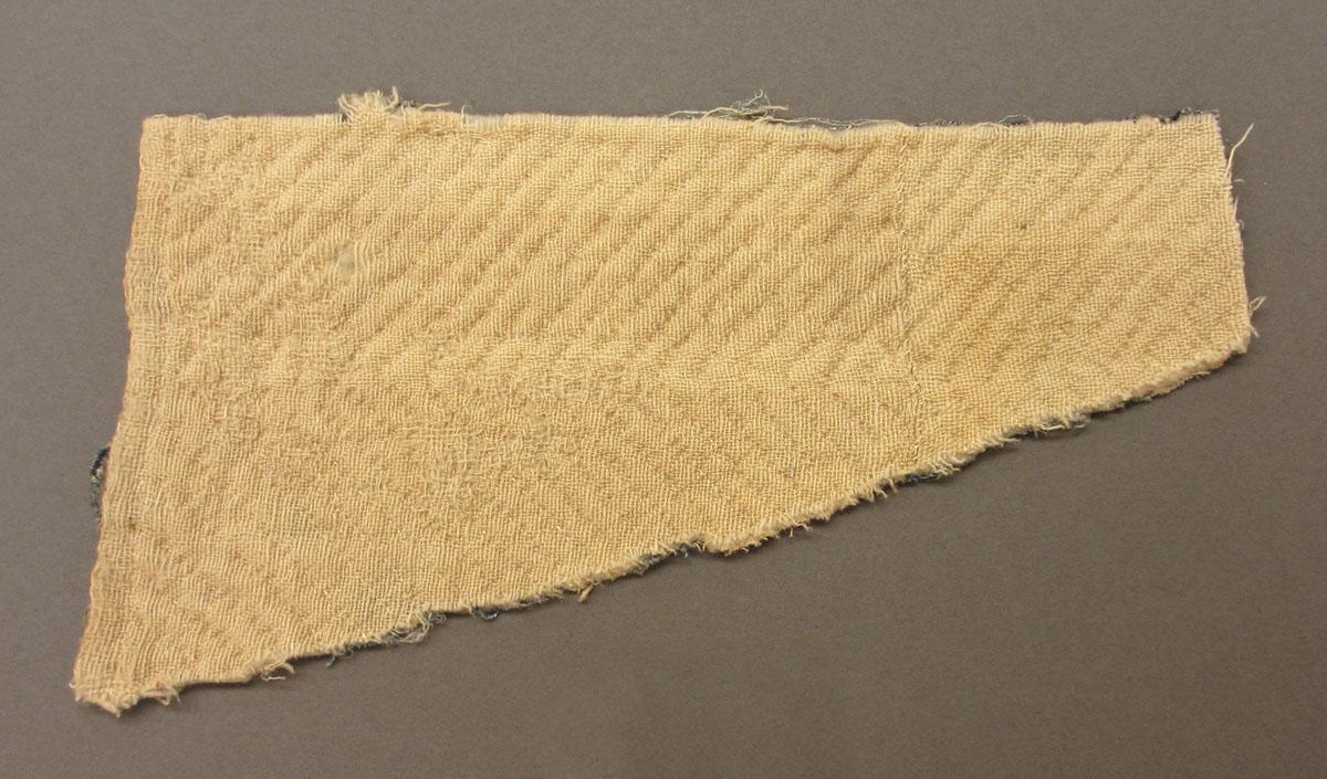 1969.3388 Textile, printed reverse