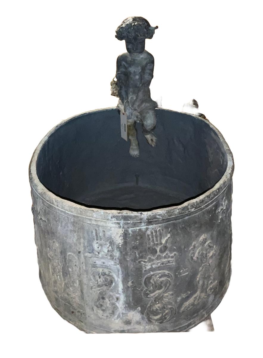 1969.3428.001 and 1969.4099.001 Cistern and Figure, overall, R-DIOC