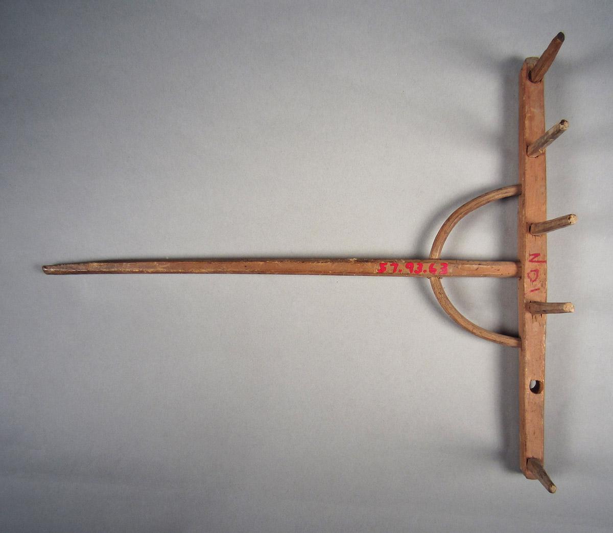 1957.0093.063 Rake, side 1
