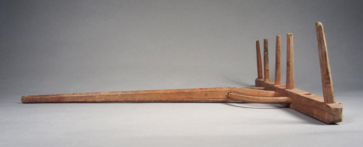 1957.0093.063 Rake, side 3