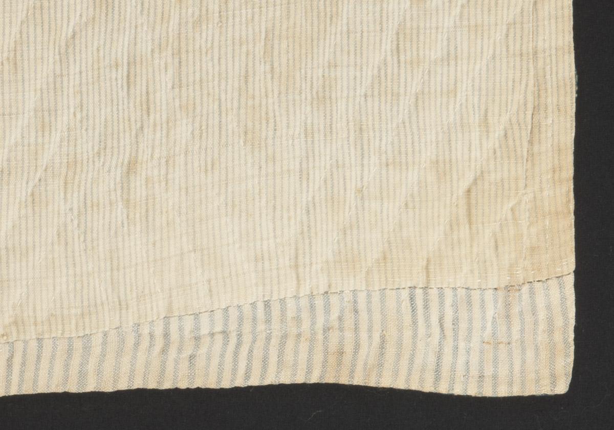 1969.3562 Quilt, reverse, detail, after conservation treatment