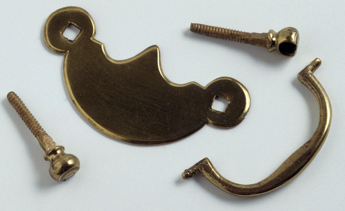 1969.3581 Desk hardware, drawer pull plate and handle